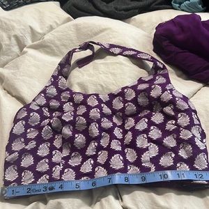 Purple Indian saree with halter style silk blouse.
